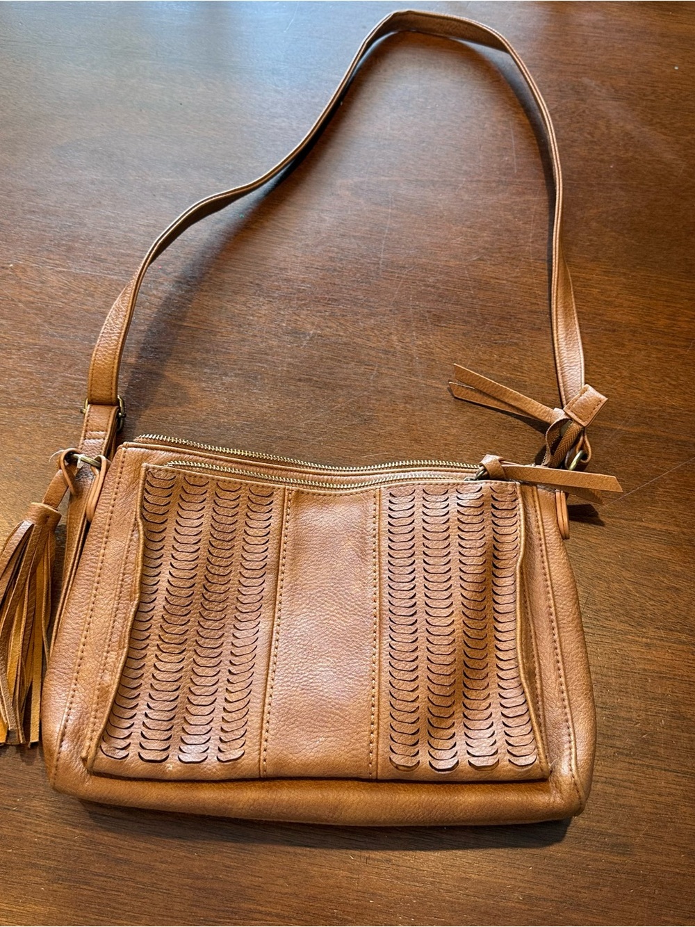 Women’s Tan Leather Crossbody Bag with Tassel Detail